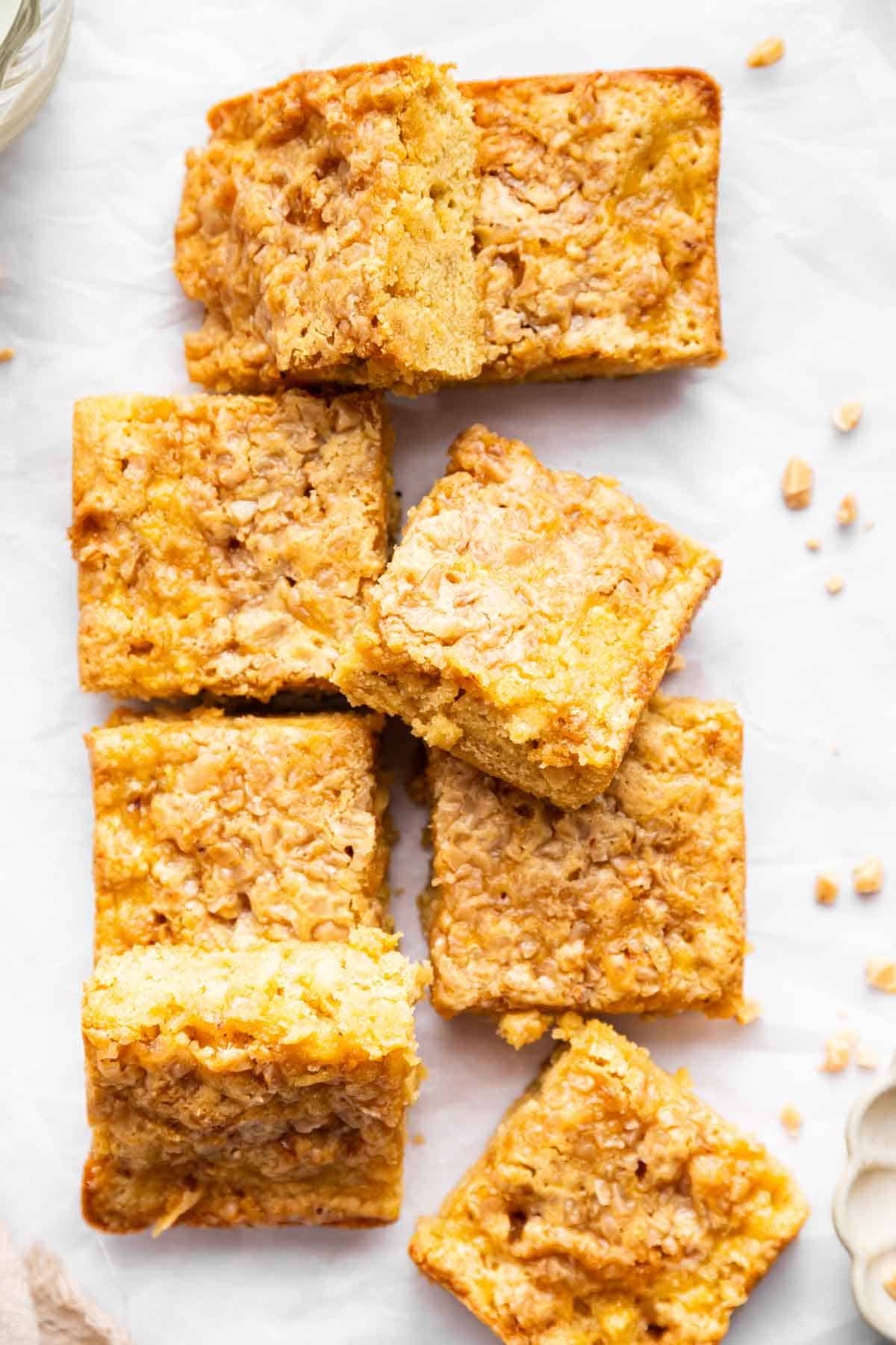 Apple blondies cut into 8 square pieces.