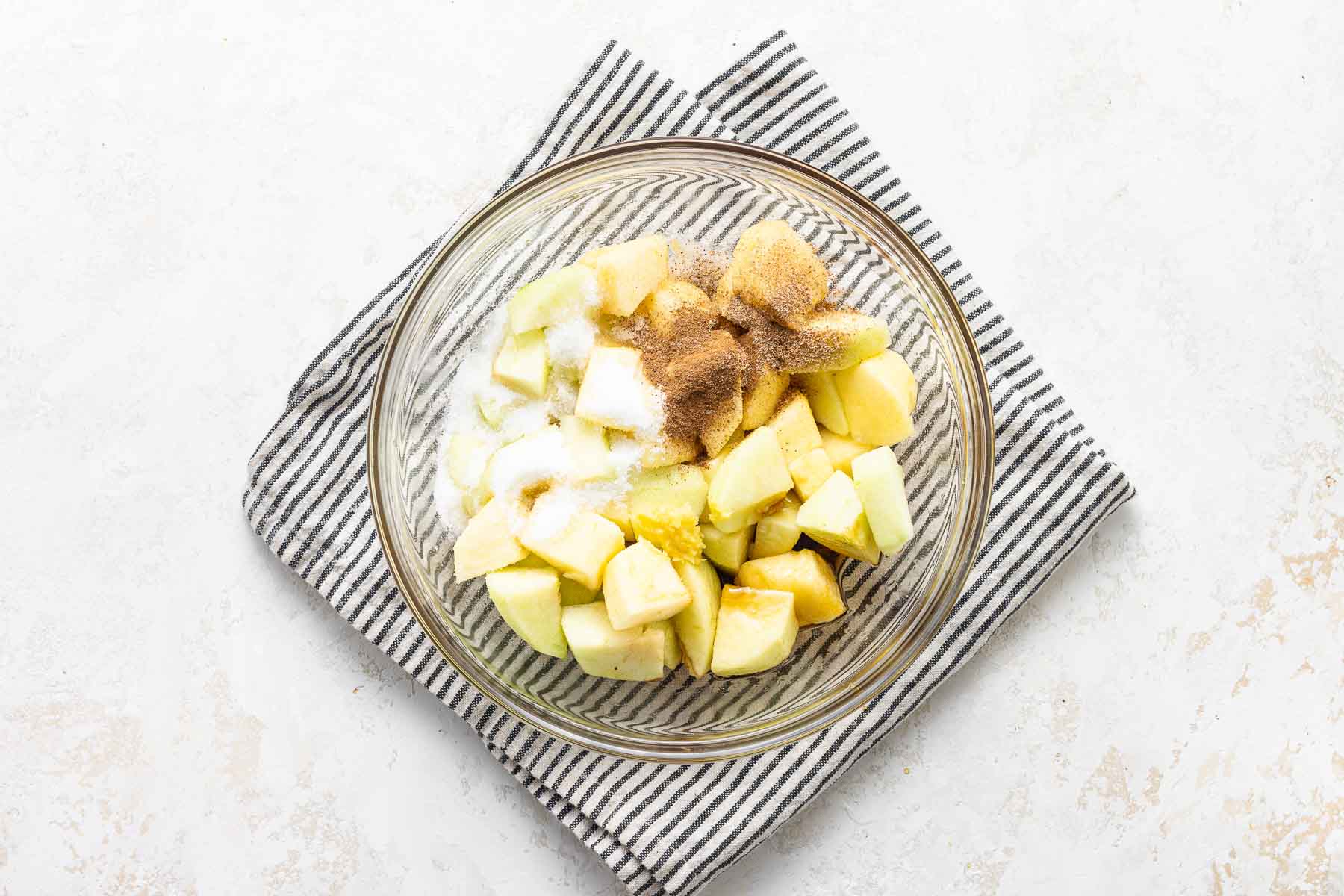 Apples tossed with spices and sugar.