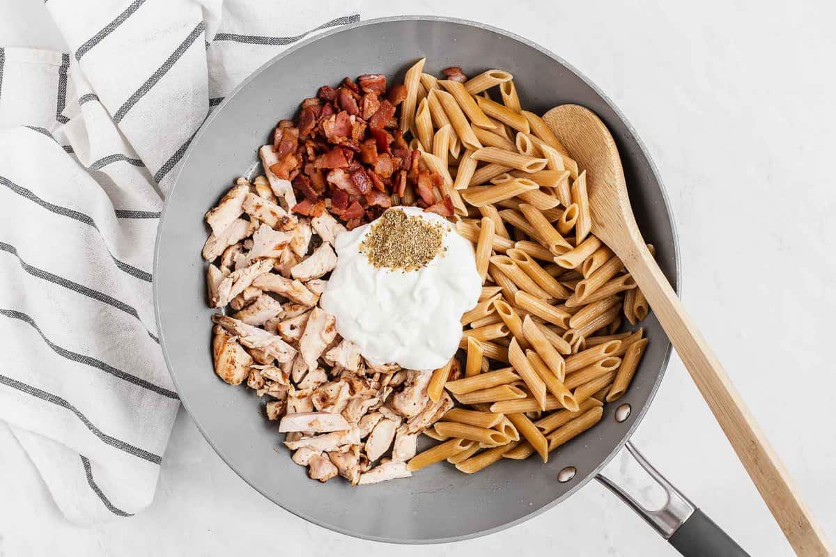 pan with chicken bacon pasta seasoning and yogurt