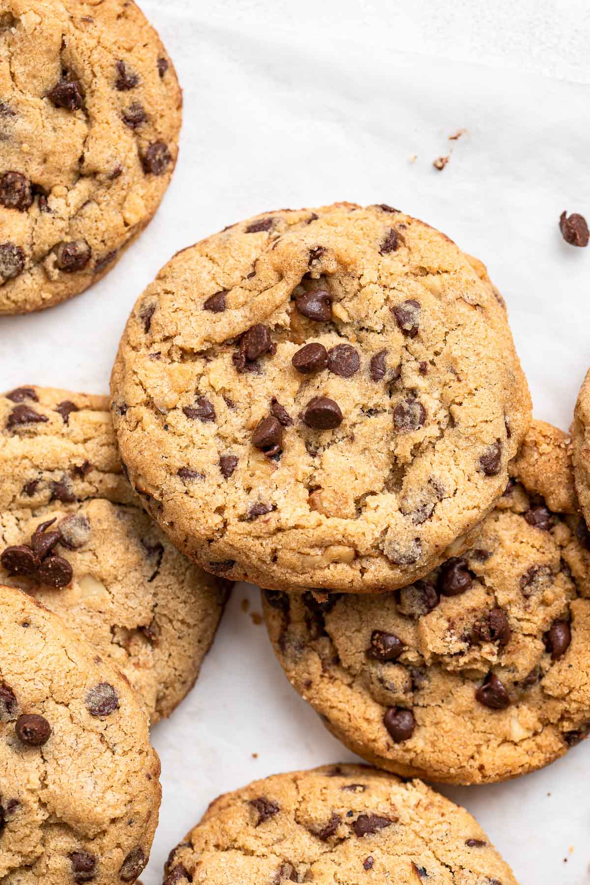 Cookie close up with chocolate chips and walnuts.