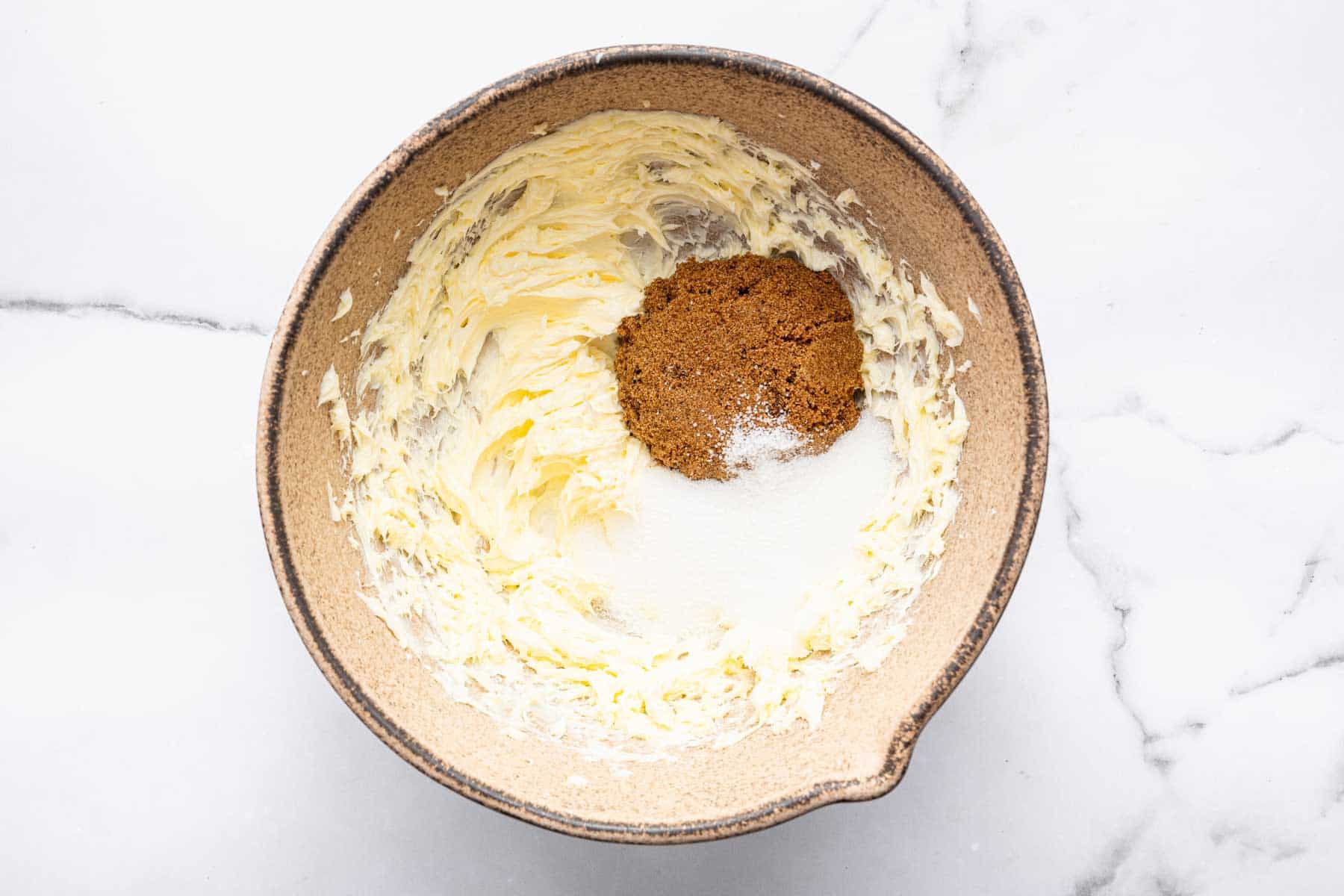 Batter with brown sugar and white sugar sprinkled on top.