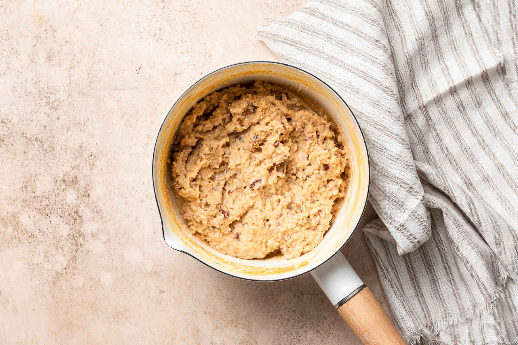 Coconut pecan frosting in pan.