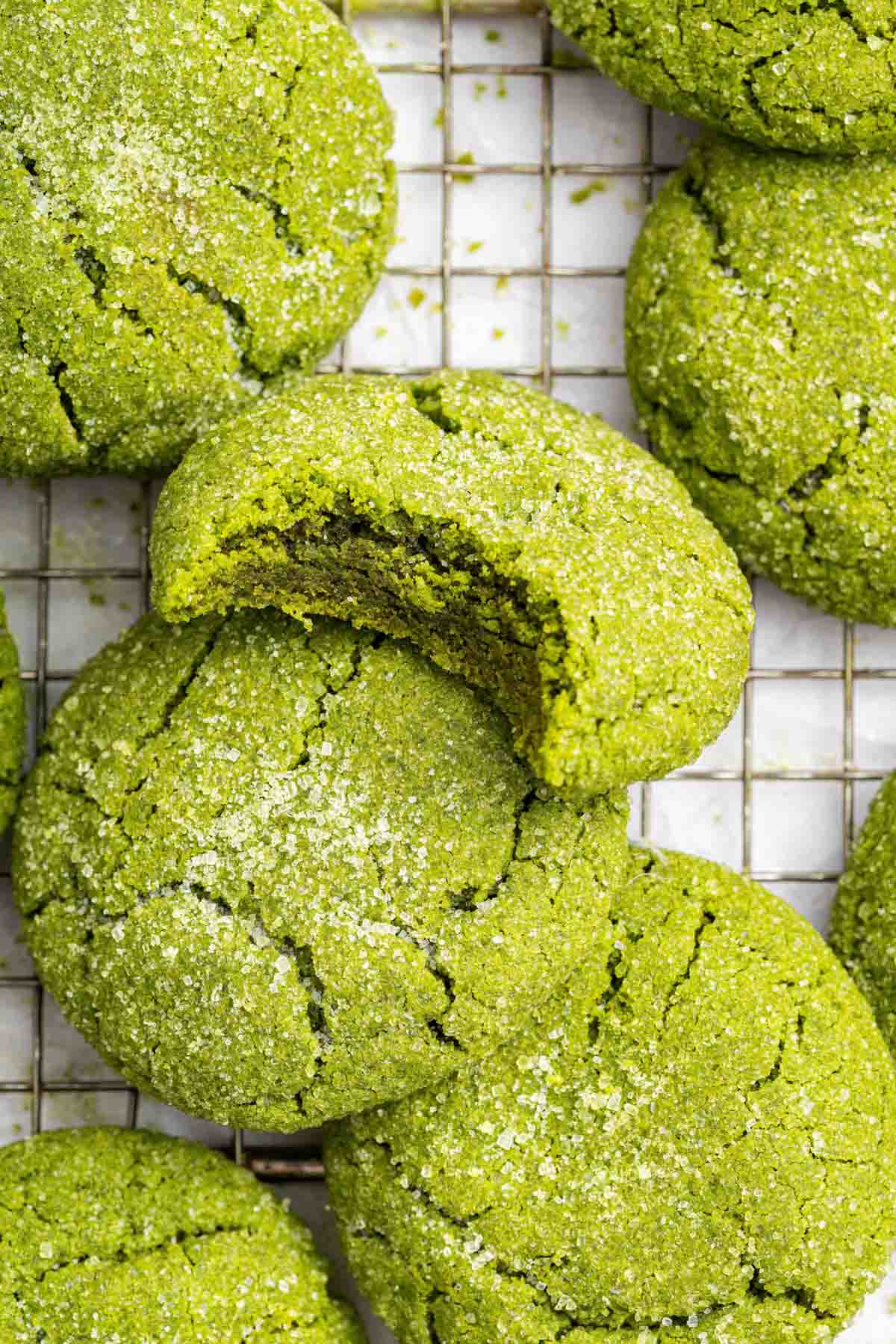 Close up of matcha green tea cookies sprinkled with sugar.