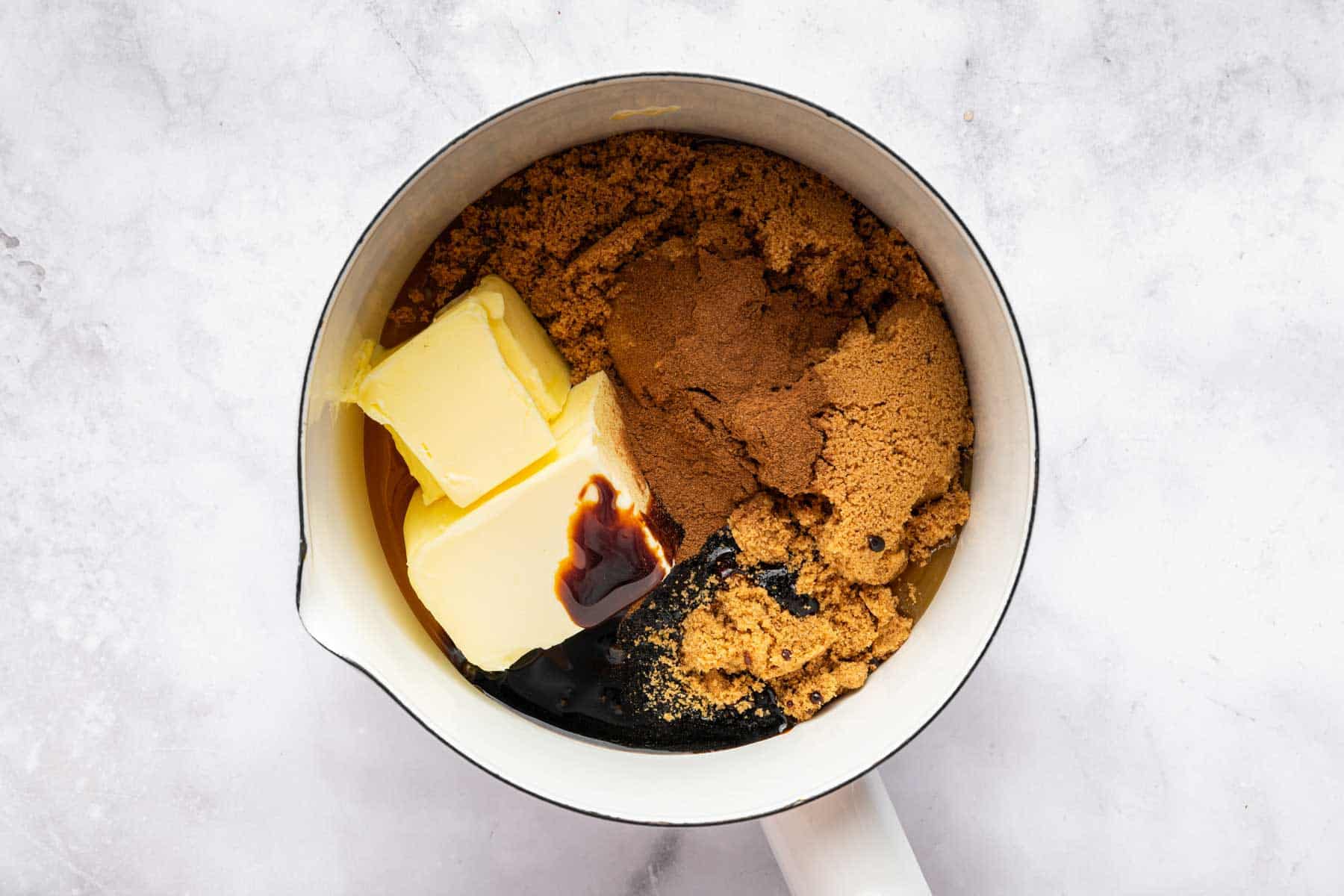 Stick of butter, brown sugar, and molasses in a small saucepan.