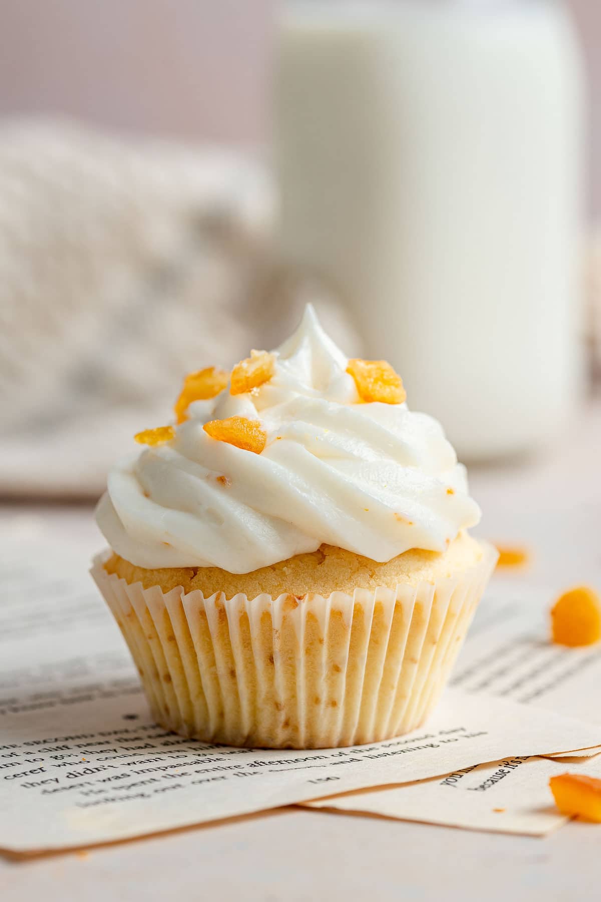 White ricotta pound cake cupcake with white frosting.